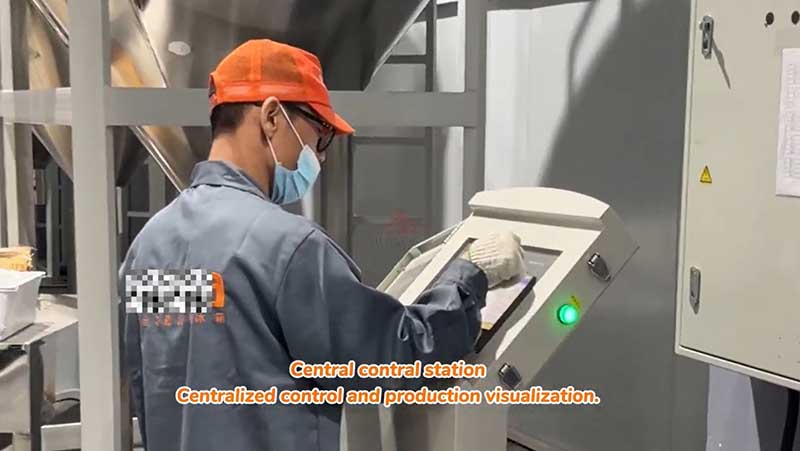 Central control station of a feeding system in a plastic injection molding workshop.